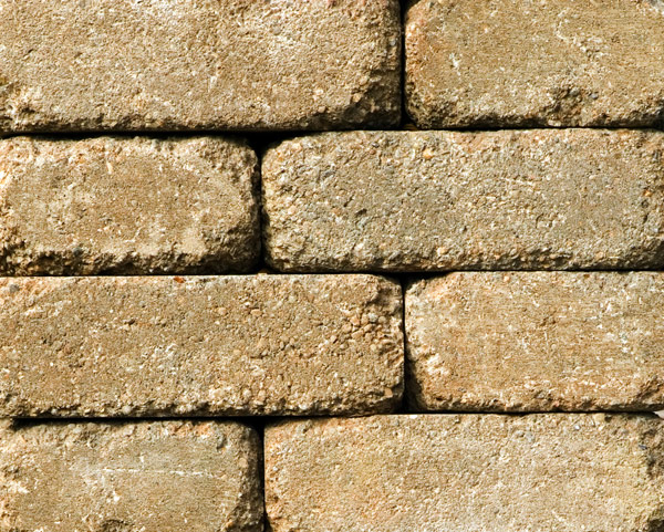 Camel buff concrete stone pieces that are a camel/tan color used in a firepit kit sold at Westview Concrete.