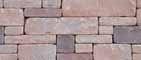 Chapel Stone Firepit Kit Canyon Blend Stones that are of various shapes and sizes and light red and pink colors.