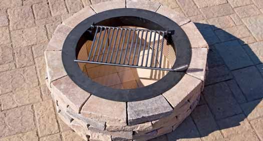 Image of a Hanover Pavers Chapel Stone® Firepit Kit provided by Westview Concrete that has been put together.