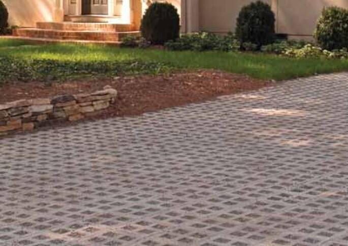 Image of driveway made of concrete pavers, pavers made to resemble wood, slate, natural stone and brick by Westview Concrete..