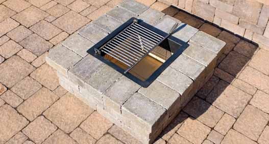 Square shaped concrete block firepit with a metal grate for cooking over the top for sale by Westview Concrete.